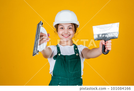 I think I can help you. kid in helmet on construction site. teen girl plasterer with tool spatula. child on repairing work. concept of renovation in workshop. busy professional carpenter with trowel I think I can help you. kid in helmet on construction site. teen girl plasterer with tool spatula. child on repairing work. concept of renovation in workshop. busy professional carpenter with trowel 101084166