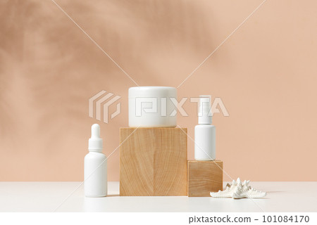 Natural background with containers for cosmetics on the wooden blocks Natural background with containers for cosmetics on the wooden blocks 101084170