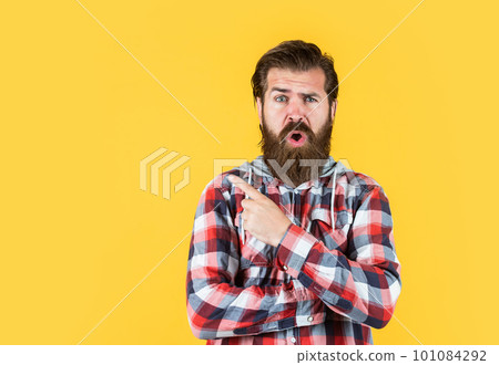 surprised stylish bearded guy with trendy hairstyle wear checkered shirt, surprise surprised stylish bearded guy with trendy hairstyle wear checkered shirt, surprise 101084292