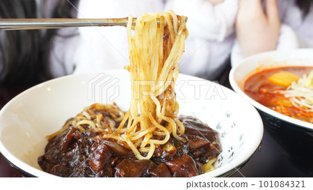 jjajangmyeon in the bowl with chopsticks jjajangmyeon in the bowl with chopsticks 101084321