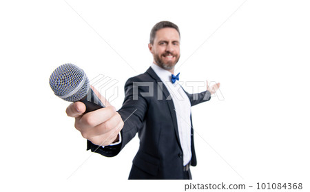 selective focus of man presenter isolated on white background. presenter man with microphone selective focus of man presenter isolated on white background. presenter man with microphone 101084368