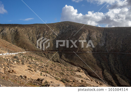 Mountains and a cloudy sky, Fuerteventura, Spain 101084514