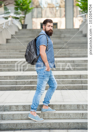 bearded man tourist with backpack. tourist with beard. brutal tourist outdoor bearded man tourist with backpack. tourist with beard. brutal tourist outdoor 101084704