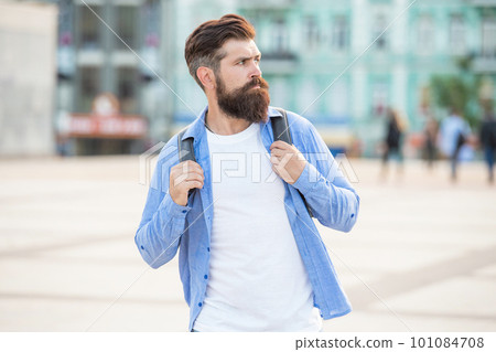 bearded man hipster outside. portrait of hipster with beard. brutal casual hipster outdoor 101084708