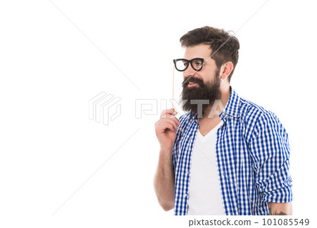 cheerful brutal bearded man hold party accessory isolated on white background with copy space cheerful brutal bearded man hold party accessory isolated on white background with copy space 101085549