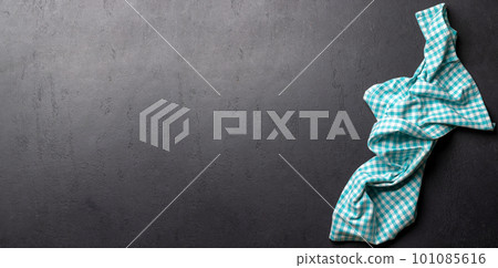 Top-down view of a kitchen table with a towel or napkin 101085616