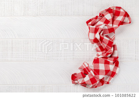 Top-down view of a kitchen table with a towel or napkin 101085622