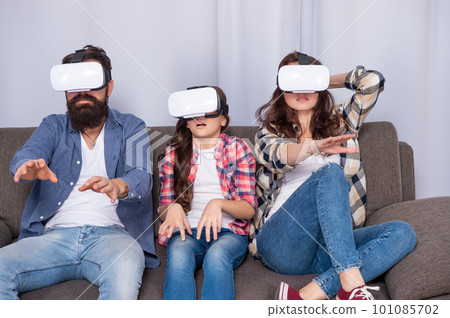 mom dad and daughter. digital future and innovation. modern life. 101085702