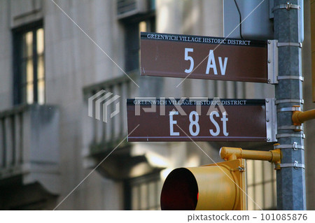 Brown East 8th Street and 5th Avenue Fashion historic sign in Midtown Manhattan in New York City in Greenwich Village Historic District Brown East 8th Street and 5th Avenue Fashion historic sign in Midtown Manhattan in New York City in Greenwich Village Historic District 101085876