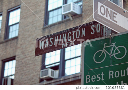 Washington Square West brown traffic sign in New York in Greenwich village historic district 101085881