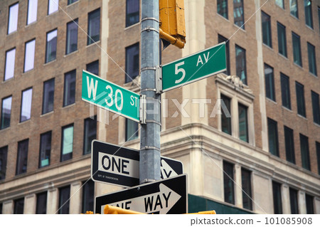 Green West 30th Street and 5th Avenue Fashion traditional sign in Midtown Manhattan 101085908