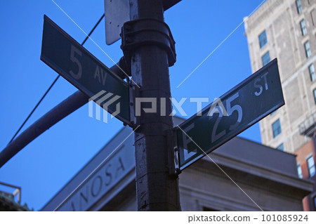 Green West 25th Street and 5th Avenue Fashion traditional sign in Midtown Manhattan 101085924