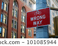 Red Wrong Way for bicycle direction traffic sign in Manhattan in New York City 101085944
