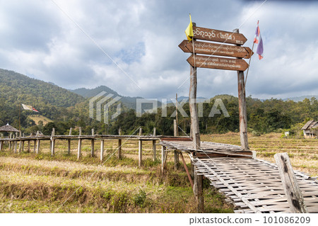Pai Buddha bamboo bridge or Boon Ko Ku So split-bamboo walkway. Thai words translated to Power of faith bridge connecting the heavens. May Happiness be with you, in English. Pai Buddha bamboo bridge or Boon Ko Ku So split-bamboo walkway. Thai words translated to Power of faith bridge connecting the heavens. May Happiness be with you, in English. 101086209