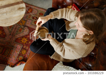 Young woman playing on a singing tibetian bowl.Relaxation and meditation.Sound therapy,alternative medicine.Buddhist healing practices.Clearing space of negative energy.Selective focus,close up. Young woman playing on a singing tibetian bowl.Relaxation and meditation.Sound therapy,alternative medicine.Buddhist healing practices.Clearing space of negative energy.Selective focus,close up. 101086229
