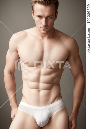 Muscular young man in a white underwear is posing for a photo. Muscular young man in a white underwear is posing for a photo. 101086709