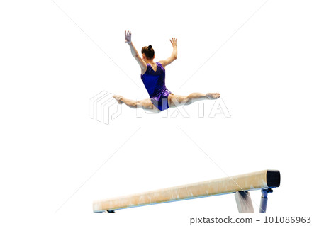 woman gymnast exercise split jump in balance beam gymnastics, sports in summer games woman gymnast exercise split jump in balance beam gymnastics, sports in summer games 101086963