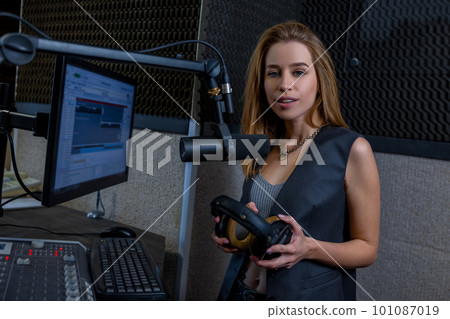 Cute young woman with headphones 101087019