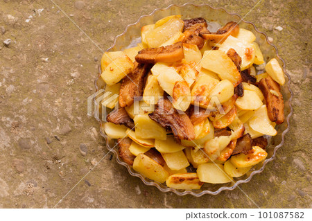 ruddy fried potatoes with slices of fried lard ruddy fried potatoes with slices of fried lard 101087582
