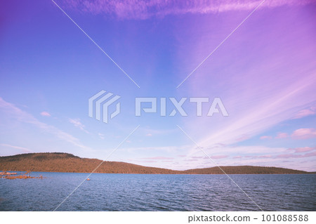 Lakeshore with evening sky in autumn. Beautiful nature of Finland Lakeshore with evening sky in autumn. Beautiful nature of Finland 101088588