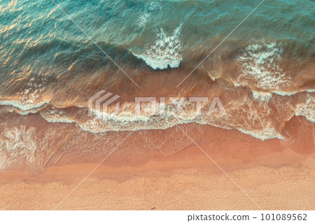 Seascape, sandy beach, sand and water, top view, abstract nature landscape background Seascape, sandy beach, sand and water, top view, abstract nature landscape background 101089562