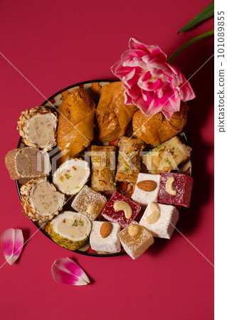Still life of oriental sweets on a pink background 101089855