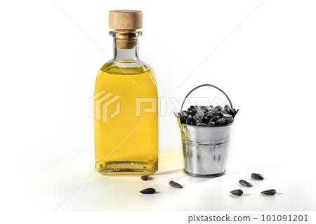 A bottle of sunflower oil with a bucket of seeds on a white background A bottle of sunflower oil with a bucket of seeds on a white background 101091201