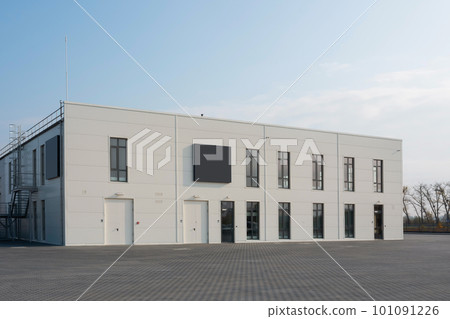 Modern building for car maintenance and repair. Two-storey office building in a closed area Modern building for car maintenance and repair. Two-storey office building in a closed area 101091226