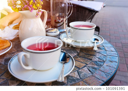 Fruit tea on a table in a cafe Fruit tea on a table in a cafe 101091391