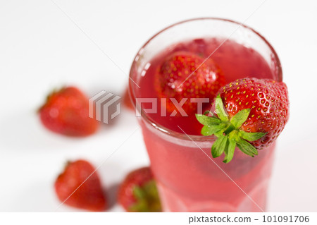 Fresh strawberry cocktail. Fresh fruit summer lemonade with strawberries and ice cubes Fresh strawberry cocktail. Fresh fruit summer lemonade with strawberries and ice cubes 101091706
