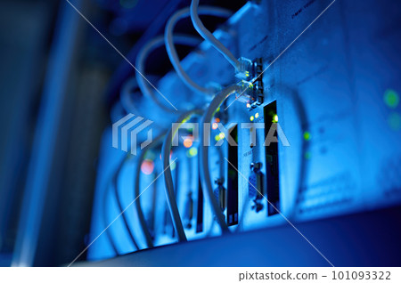 Closeup network server room with fiber optic hub 101093322