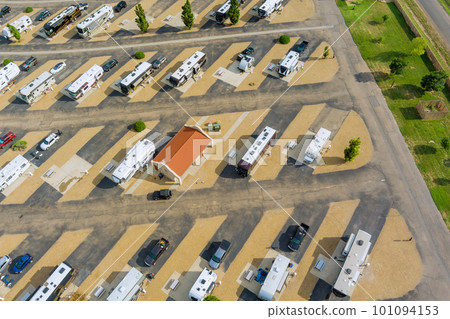 Trailer RV vacation at recreational vehicle park camping area Trailer RV vacation at recreational vehicle park camping area 101094153