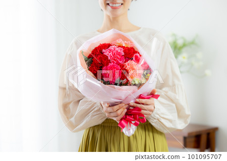 A mother receiving carnations on Mother's Day 101095707