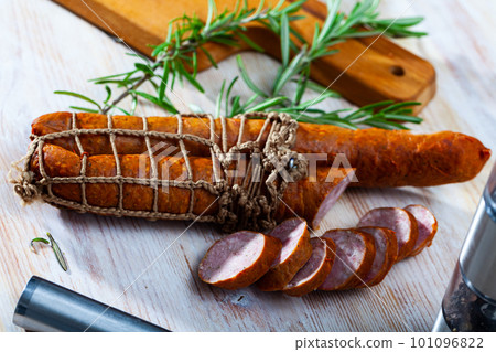 Lean smoked ham sausage on wooden table Lean smoked ham sausage on wooden table 101096822