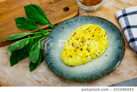 Delicious fried cottage cheese for breakfast. Bread and greens included Delicious fried cottage cheese for breakfast. Bread and greens included 101096883