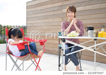 Parents and children eating on the balcony Parents and children eating on the balcony 101097047