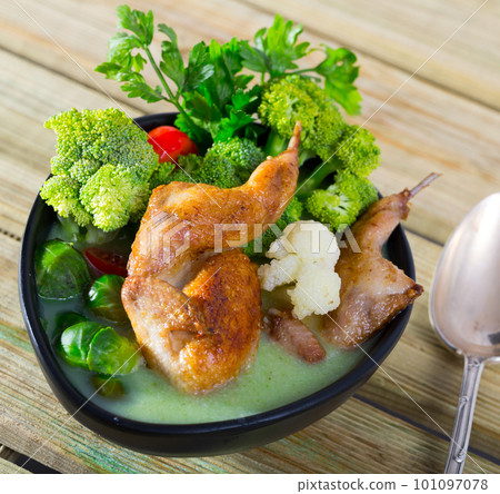 Cabbage soup with quails and greens 101097078
