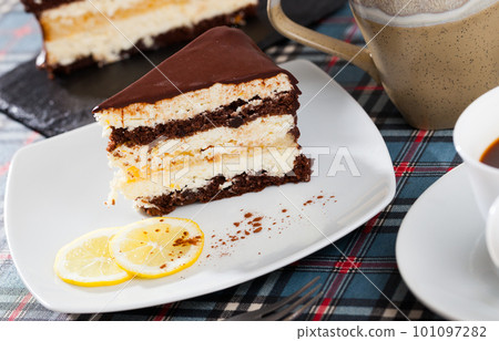 Delicious lemon chocolate cake closeup Delicious lemon chocolate cake closeup 101097282