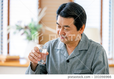 Senior men drinking water Senior men drinking water 101098966