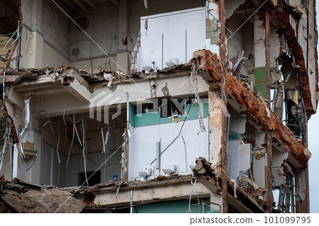 dismantled old building. Half demolished house, dismantling of the old one for the construction of a new building 101099795