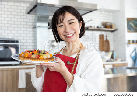 A woman working in a cafe 101100102