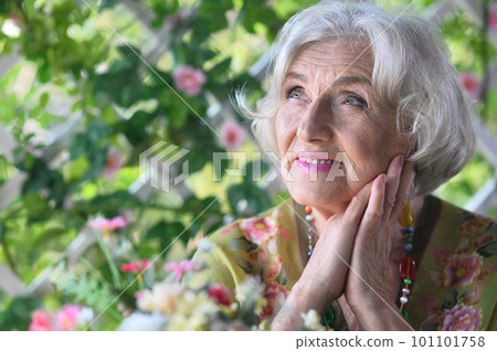 portrait of a beautiful woman in summer 101101758