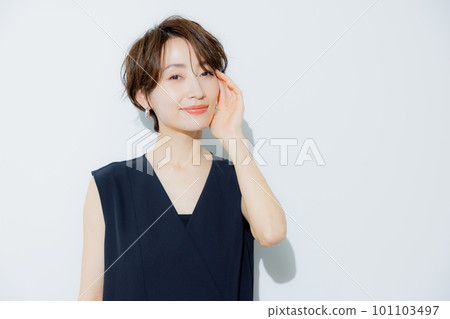 A woman with short hair A woman with short hair 101103497