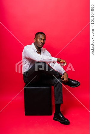 Happy african american young businessman in formal suit. Smiling confident black guy 101104096