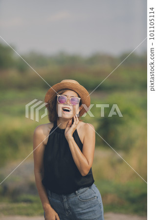 happiness face of asian woman standing outdoor 101105114