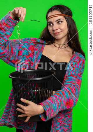 Woman taking off, throwing out glasses into bin after medical vision laser treatment therapy surgery 101105715