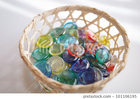 Colorful marbles in a basket Colorful marbles in a basket 101106195