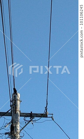 A cloudless blue sky and electric wires A cloudless blue sky and electric wires 101106245