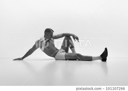 Handsome young muscular man posing shirtless over studio background. Masculinity and strength Handsome young muscular man posing shirtless over studio background. Masculinity and strength 101107266