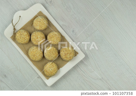 Frozen cutlets. Preparations of homemade food. Ready for cooking. Top view. Frozen cutlets. Preparations of homemade food. Ready for cooking. Top view. 101107358